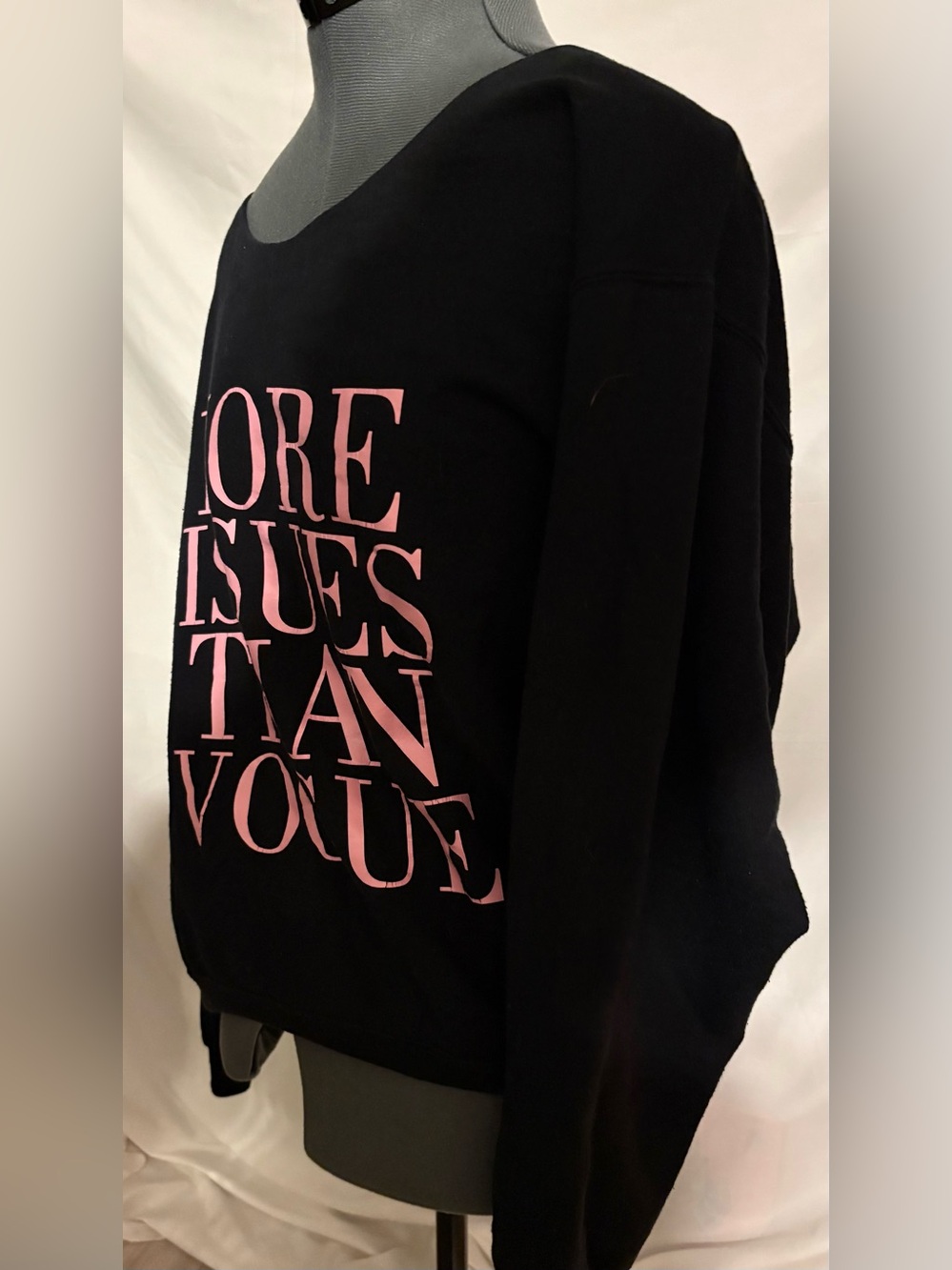 Black Off-the-Shoulder Sweater with Pink MORE ISSUES THAN VOGUE graphic